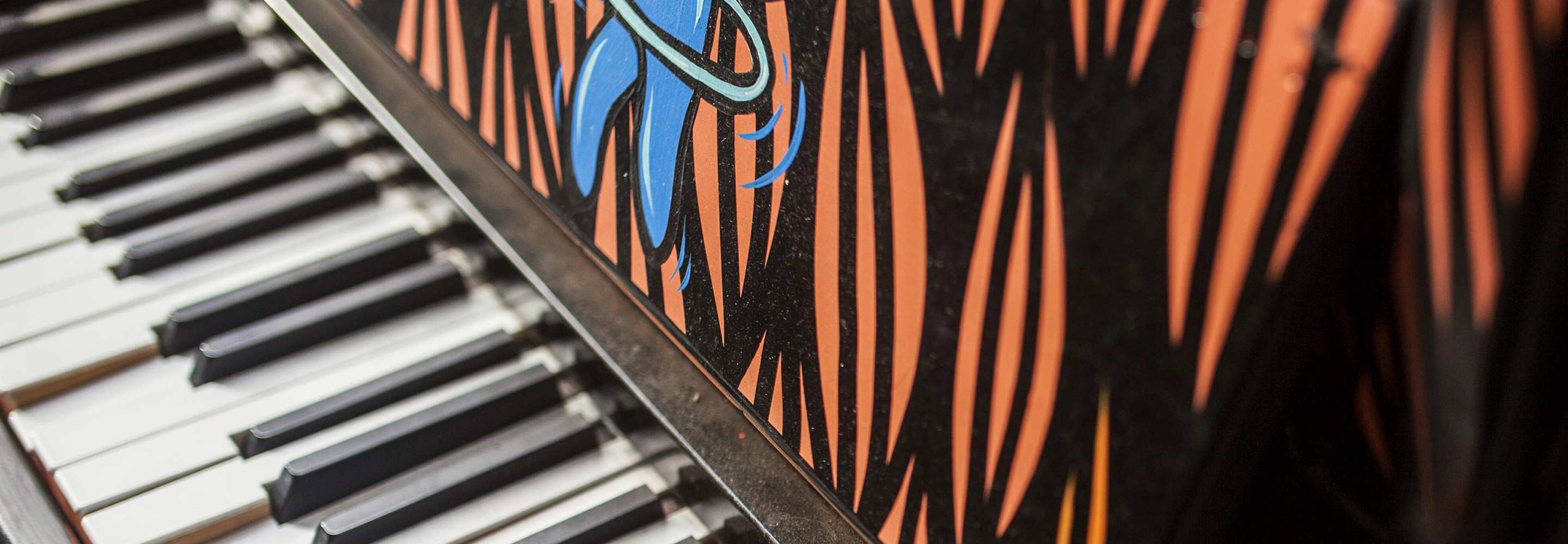 Keyboard next to graffiti