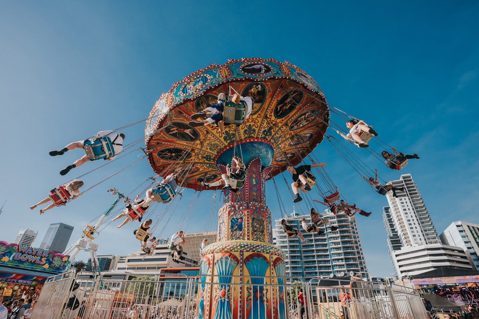people on swing ride