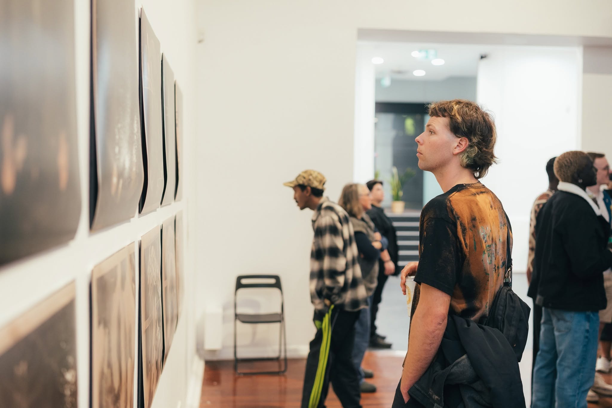 person looking at art