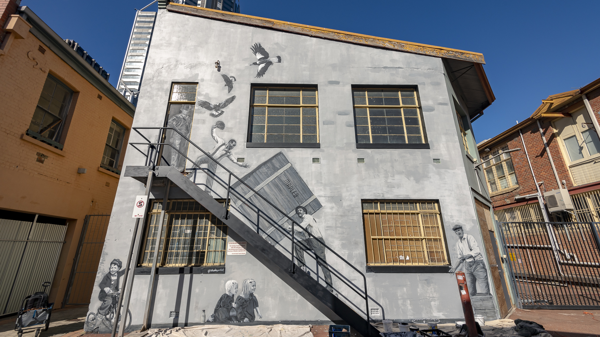 Mural by Jacob 'Shakey' Butler in Wolf Lane